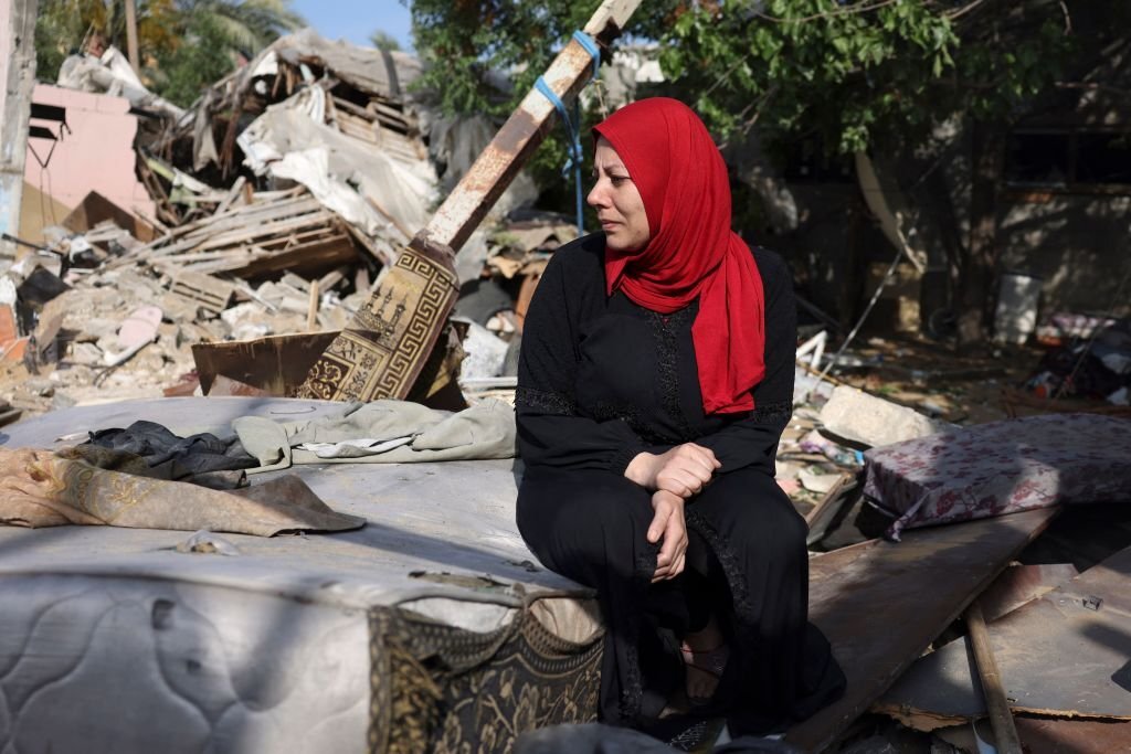 Gaza truce holds as Palestinians count deadly cost