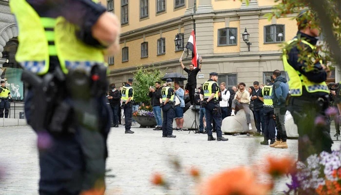 Swedish police arrest two as riot breaks out at protest involving Holy Quran’s desecration