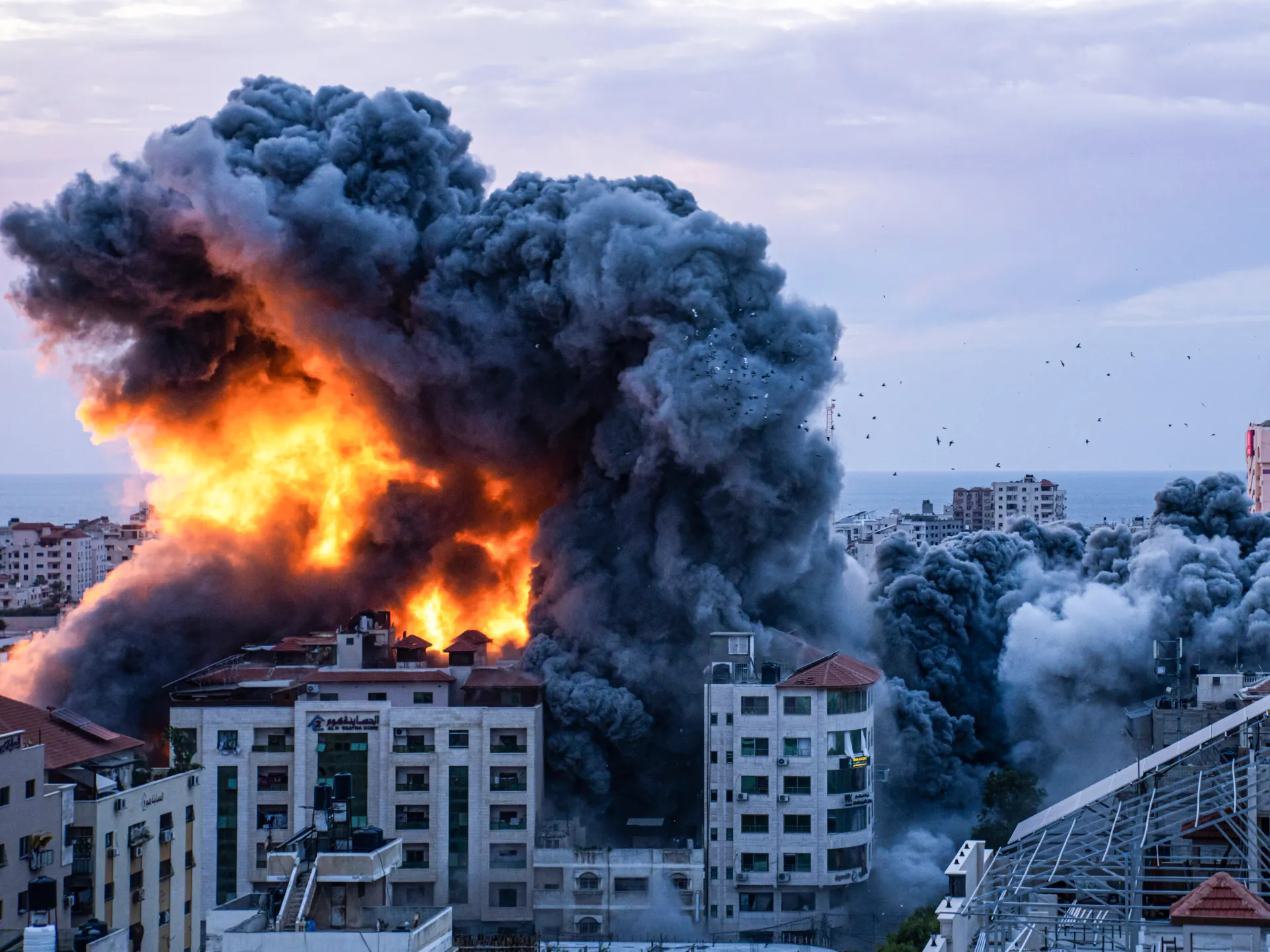 Israel imposes 'total blockade' on Gaza as aircraft continue to pound enclave