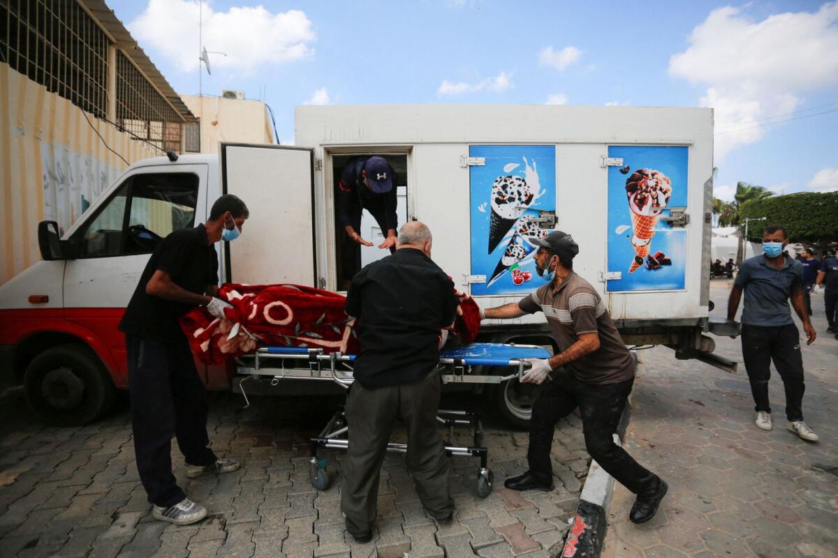 Ice-cream truck being used as mortuary as bodies pile up in Gaza