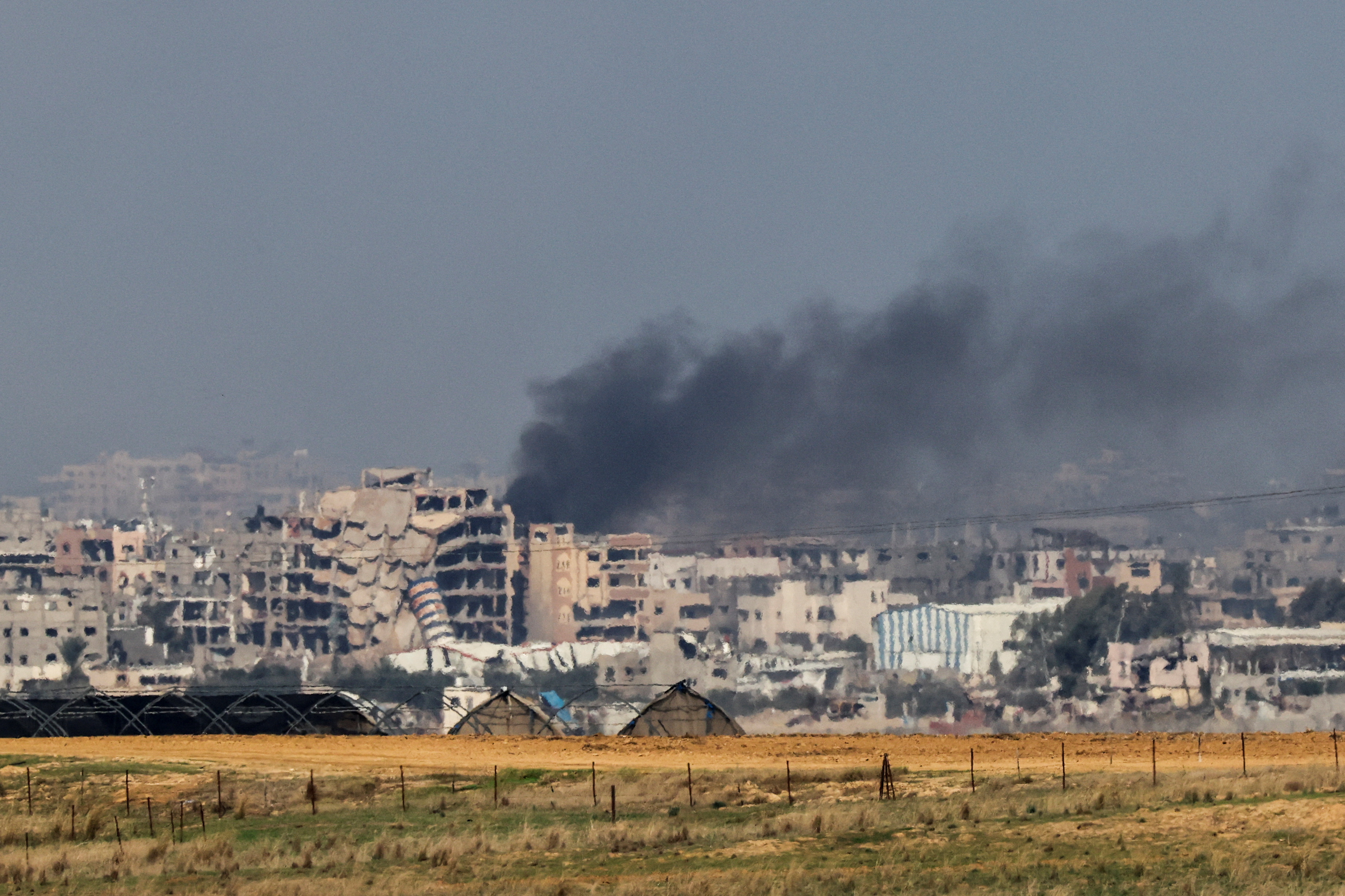 Israel charges back into Gaza City, US vows 'all necessary actions' after troops killed