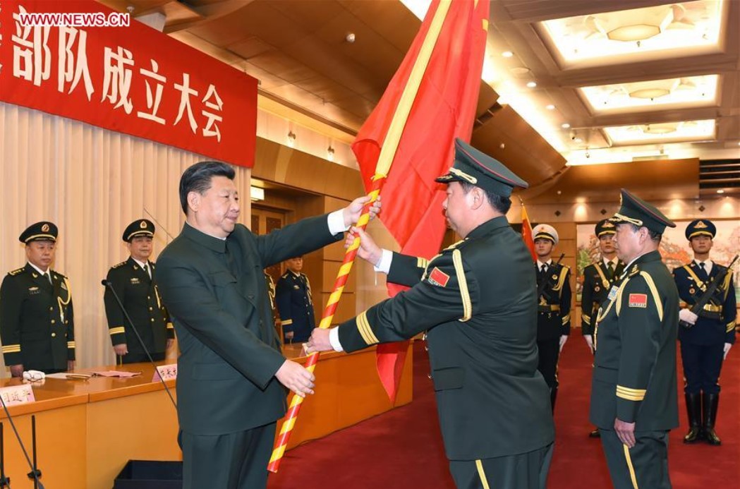 Xi Jinping presents flag to PLA Information Support Force