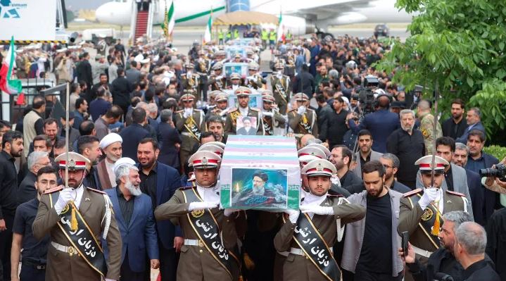 Iran's supreme leader leads prayers at Ebrahim Raisi's funeral