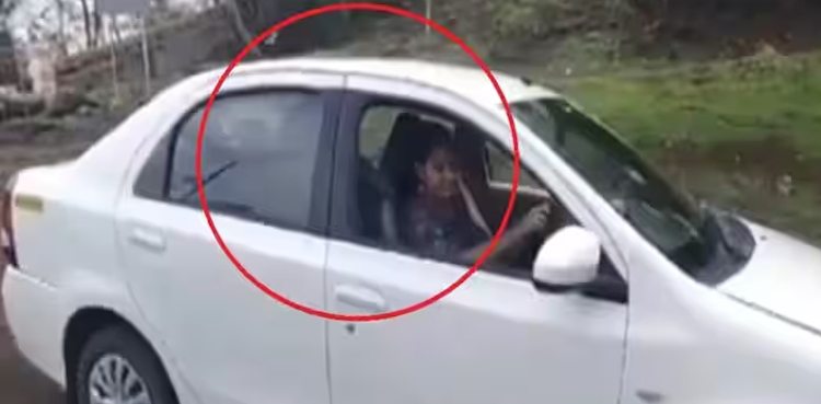 Woman falls off 300-foot cliff while reversing car