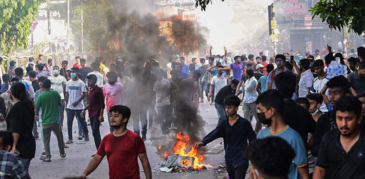 Bangladesh protesters set state TV HQ ablaze as toll mounts, internet cut