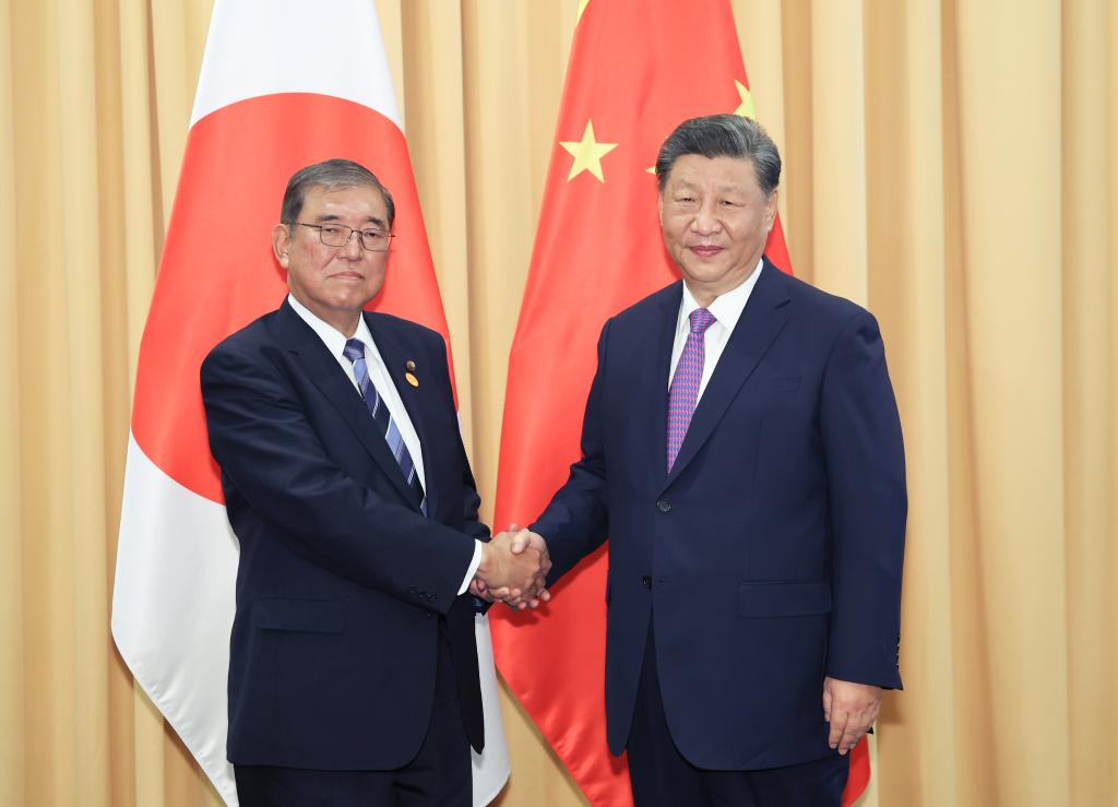 Xi says China-Japan relations in critical period of improvement, development