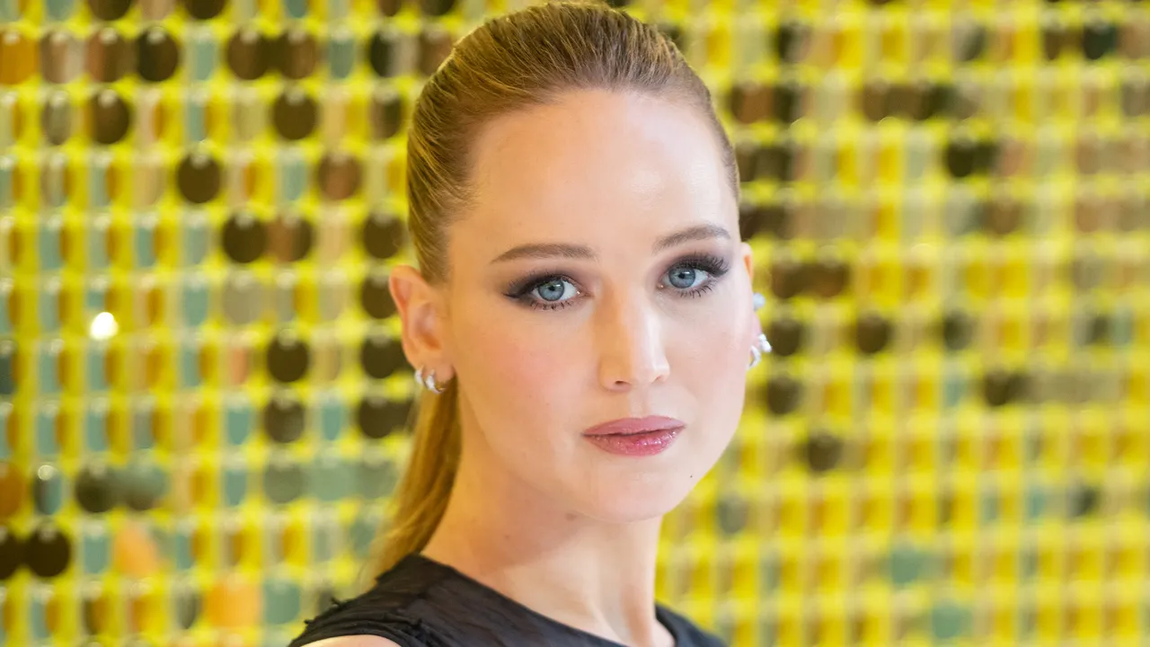 Jennifer Lawrence Showcases Baby Bump in Couture at Star-Studded Premiere