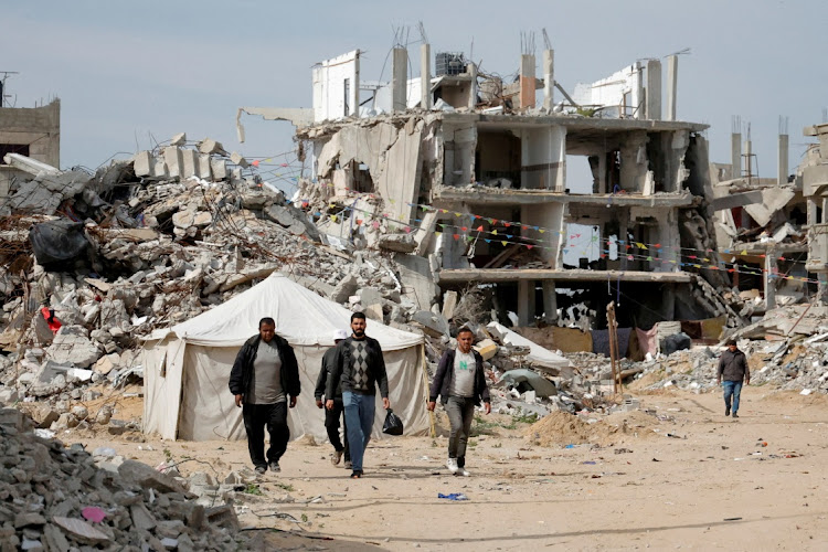 Israeli strikes kill 12 in Gaza as aid access remains deadly
