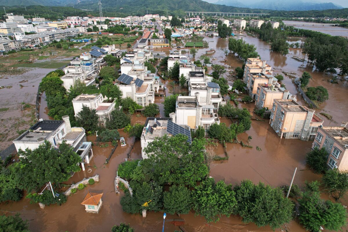 Extreme weather kills 30 in Beijing as year's rain falls in a week