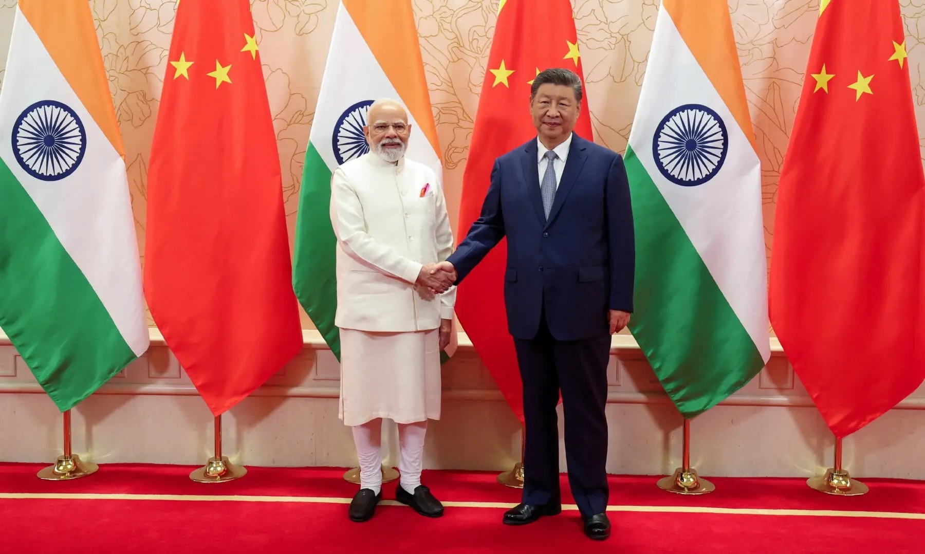 India committed to improving ties with China, Modi tells Xi