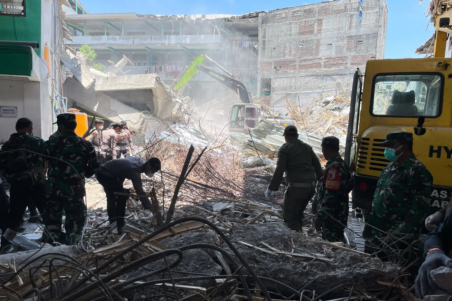 Death toll from Indonesia school collapse climbs to 54, search for bodies continues