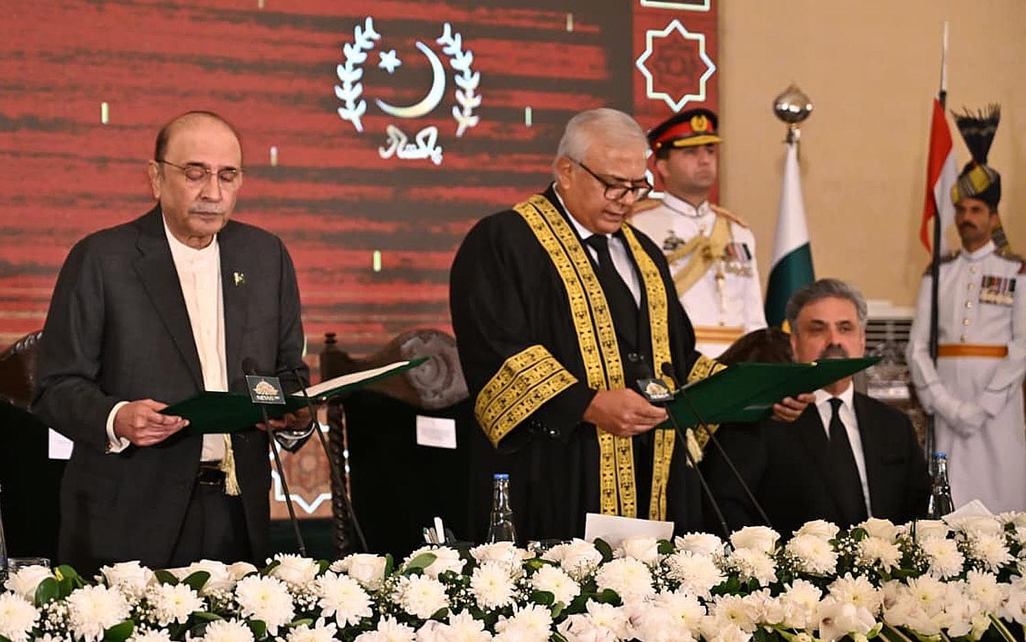 President administers oath to Justice Aminuddin Khan as first CJ of FCC