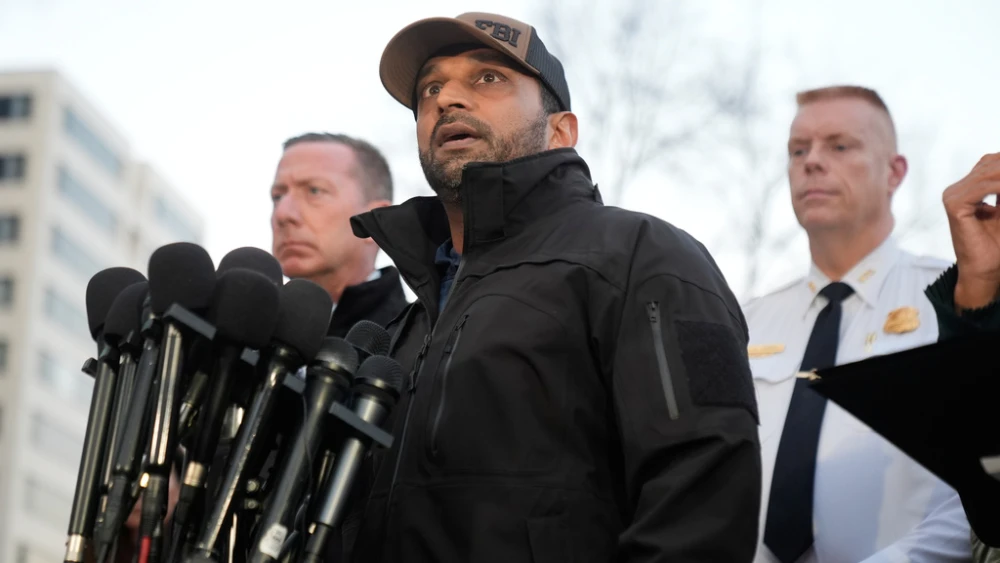 Afghan charged for Guard shooting in Washington