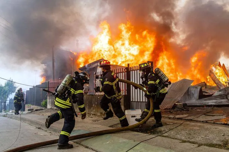 Chile fires kill at least 18 as firefighters battle extreme heat, winds