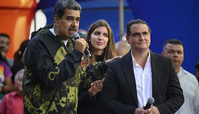 Venezuela interim leader sacks industry minister allied with ousted president Maduro