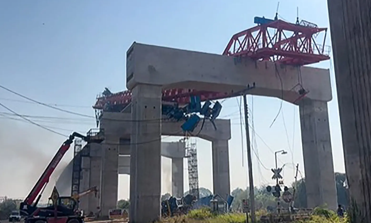 Crane falls onto train in Thailand, killing 32 and injuring dozens